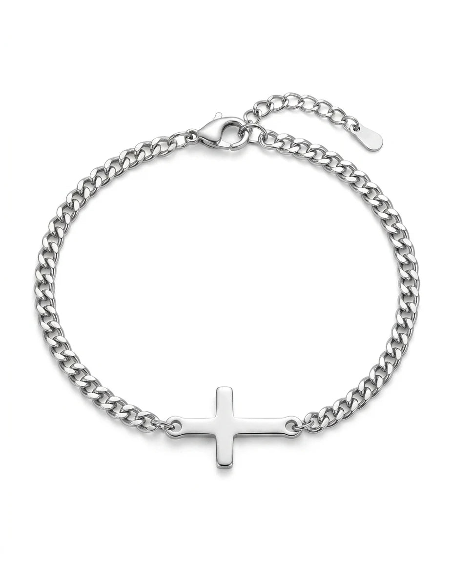 Silver Stellan sideways-cross bracelet on a white background, clasp and extender chain visible