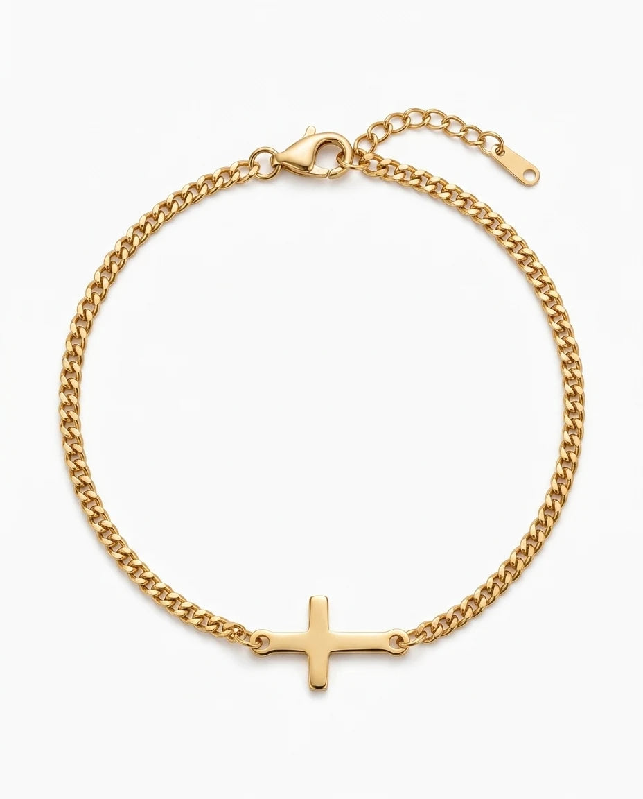 Gold Stellan sideways-cross bracelet on a white background